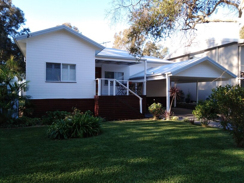 Exterior of house painted white